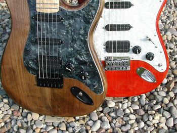 High angle view of guitar on stone