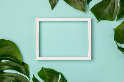 Directly above shot of blue table against wall at home