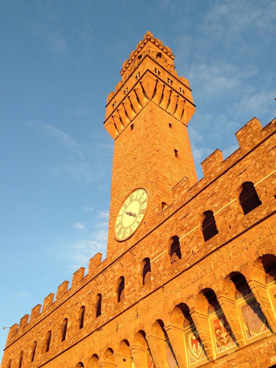 architecture, low angle view, building exterior, built structure, sky, history, tower, clock tower, blue, famous place, religion, day, old, travel destinations, cloud, cloud - sky, place of worship, sunlight, outdoors, the past