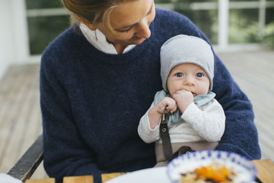 Mother with baby in cafe