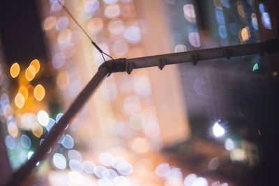 Close-up of illuminated lights at night