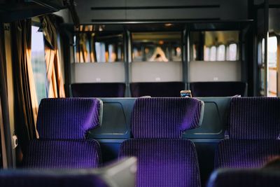 Empty purple seats in train