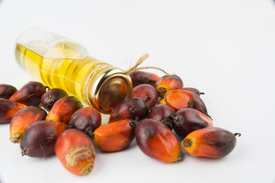 Close-up of fruits against white background