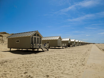 Holiday homes on the kijkduin beach in perspective on a lovely day in may.