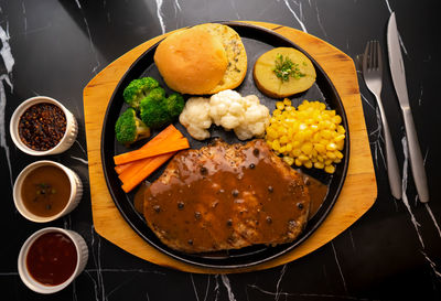 High angle view of food served on table