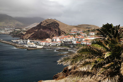 View of town with mountain range in background