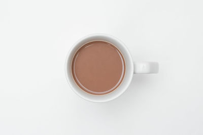 Directly above shot of coffee cup against white background