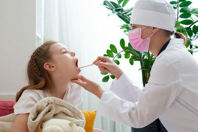 Doctor examining patient