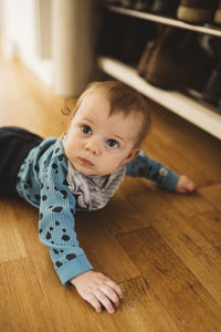 Baby crawling on floor