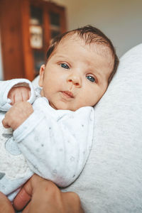 Portrait of cute baby girl at home