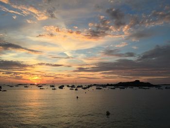 Scenic view of sea against sky at sunset