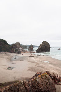 Scenic view of beach against clear sky