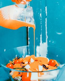 Close-up of orange fruit in swimming pool