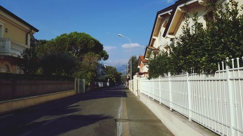 Road with buildings in background