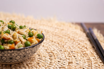 Close-up of chopped vegetables in bowl on table