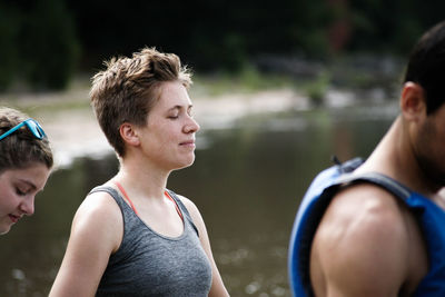 Young couple looking at lake