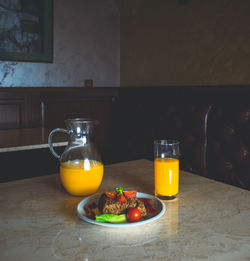 Yellow and drink on table