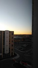 Cityscape against sky during sunset