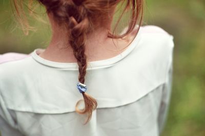 Rear view of girl with braided hair