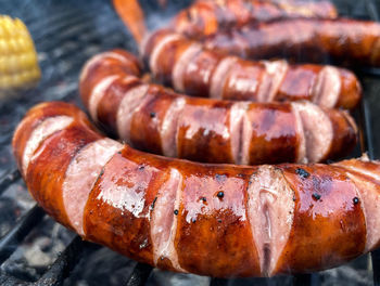 High angle view of meat on barbecue grill