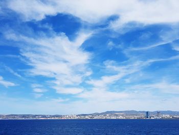 Scenic view of sea against blue sky