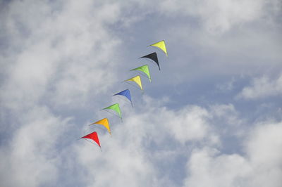 Low angle view of kite flying in sky