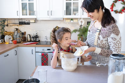 Family in kitchen