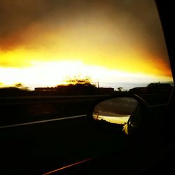 Sunset seen through train windshield