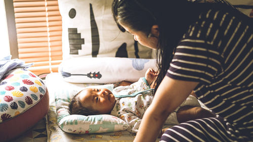 Mother talk to newborn baby