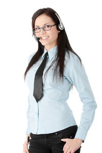 Portrait of a smiling young woman against white background
