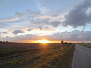 Road passing through field