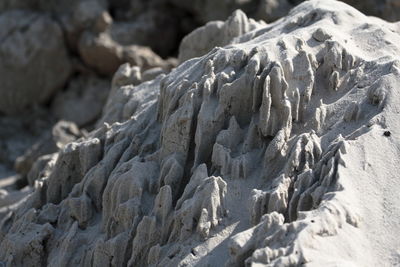 Close-up of snow on rocks