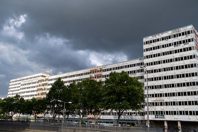 Buildings in city against sky