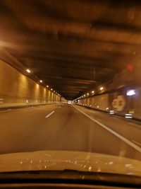 Illuminated road seen from bridge