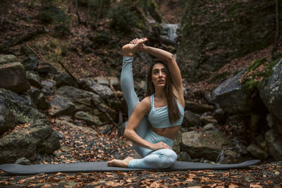 Woman standing on rock