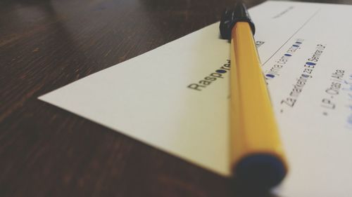 Close-up of text on wooden wall