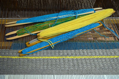 High angle view of tied up threads