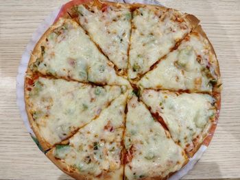 High angle view of pizza in plate on table