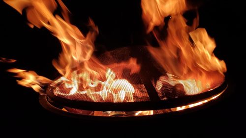 Close-up of fire against black background