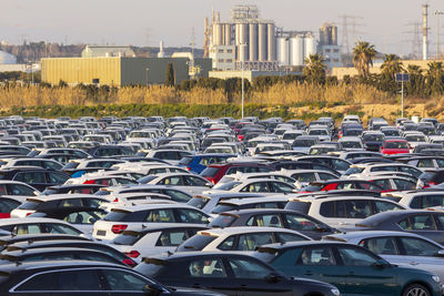 Import of new cars in the automotive industry, in a parking