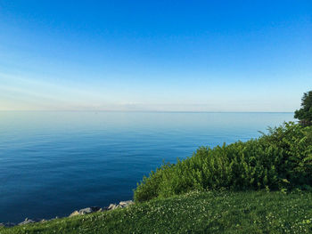 Scenic view of lake ontario against clear blue sky