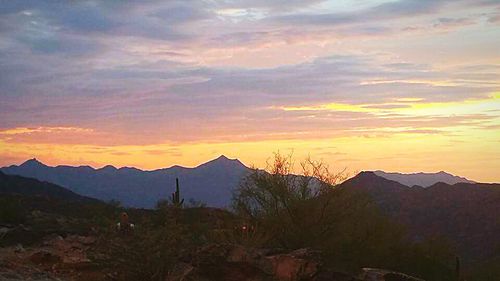 Scenic view of mountains at sunset