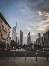 View of buildings against cloudy sky