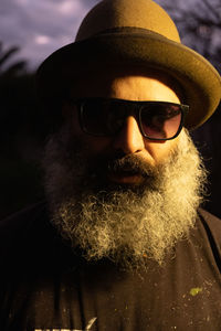 Close-up portrait of fancy bearded man