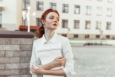 Woman standing in campus