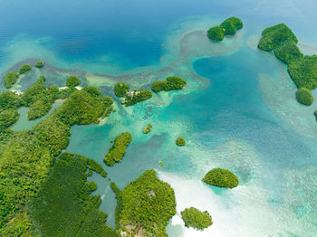 Aerial view of bay and lagoon with islands. seascape in the tropics. sipalay, negros, philippines.