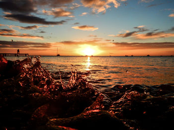 Scenic view of sea against sky during sunset