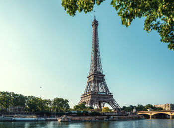 View of tower at riverbank