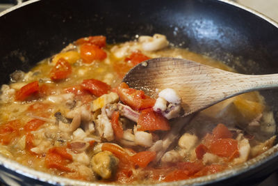 Close-up of meat in cooking pan