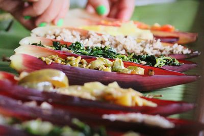 Cropped image of woman making food